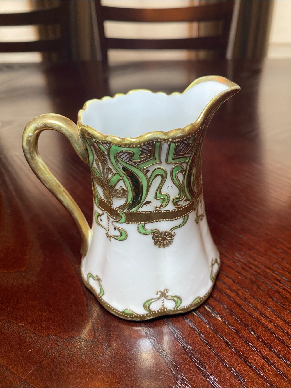 Antique Nippon Hand-Painted porcelain creamer with Gilded Moriage. 4 inches tall